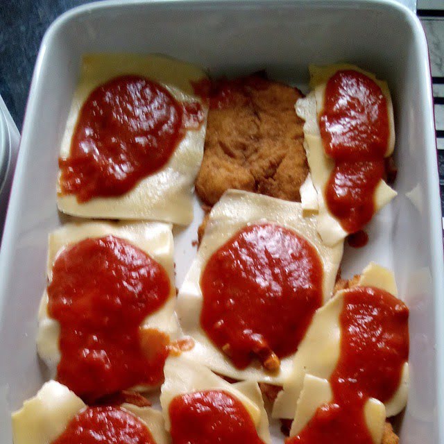 Filé de frango à parmegiana